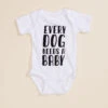 Every Dog Needs A Baby Bodysuit