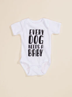 Every Dog Needs A Baby Bodysuit